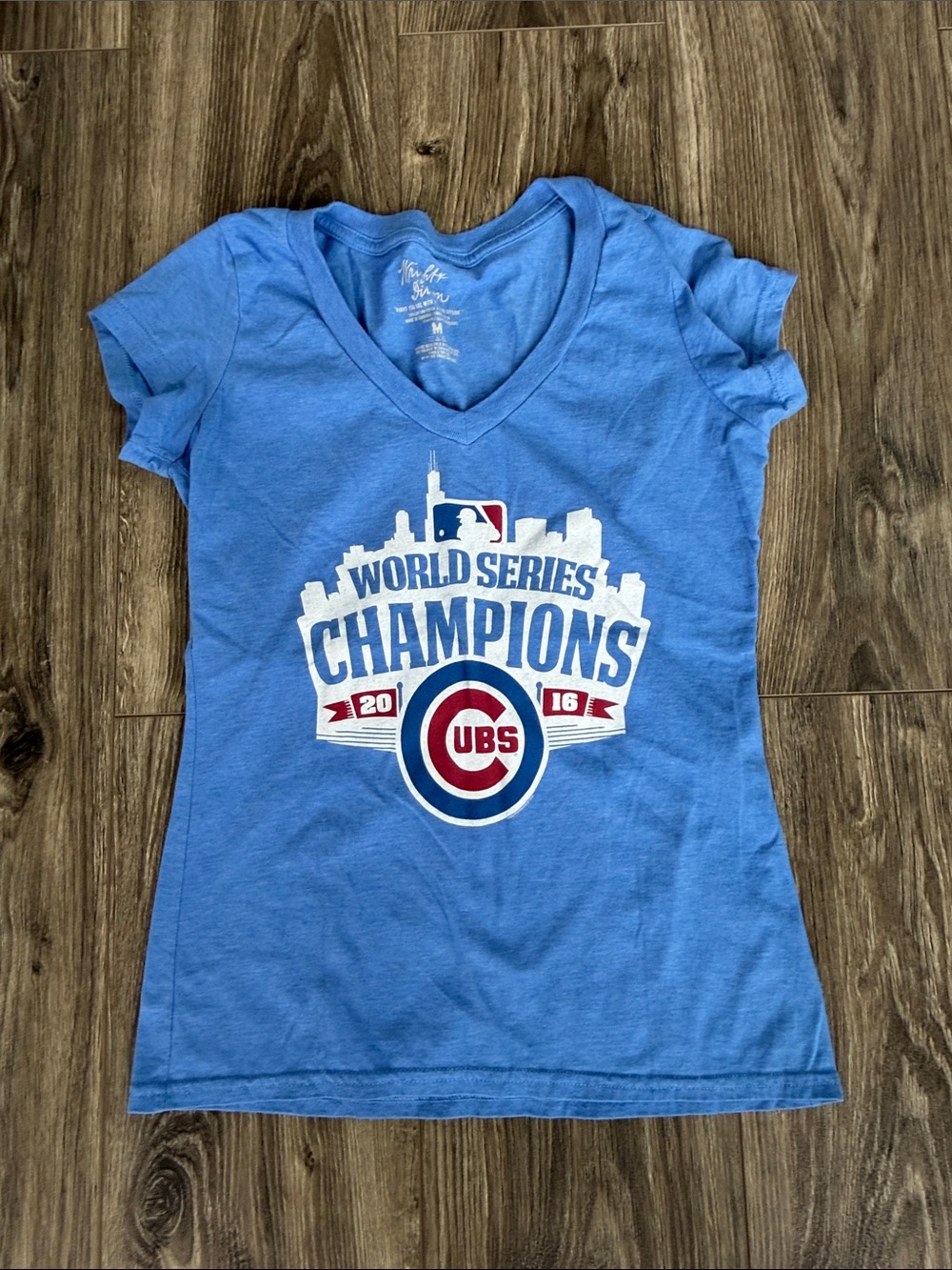 Wright & Ditson Light Blue V-Neck World Series Champions Tee